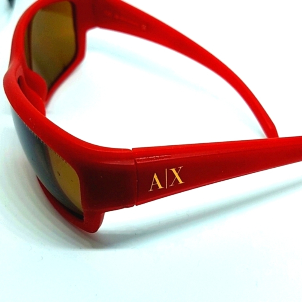 ARMANI EXCHANGE SUNGLASSES SMALL SCRATCHES ON THE LEFT LENS BARLEY VISIBLE